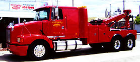 Red Kenworth-style IVT wrecker