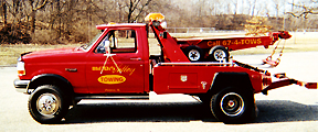 Red Illinois Valley Towing light-duty wrecker, side